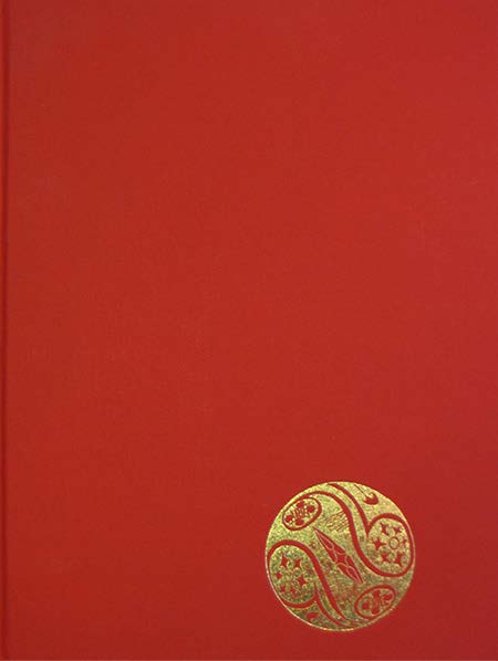 Red book with a gold decorative emblem on a red background