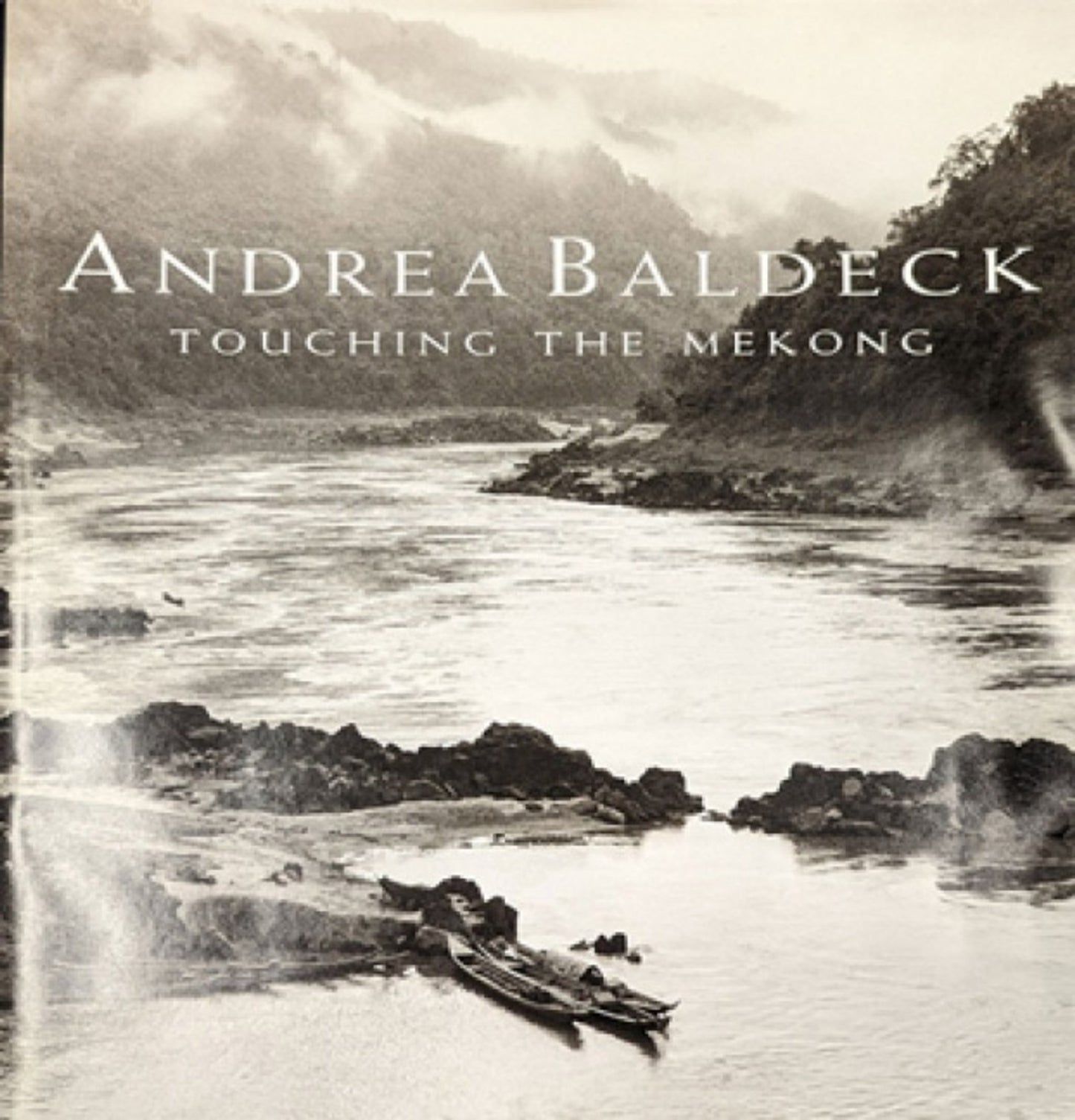 Cover image for Touching the Mekong ISBN 9781931707558